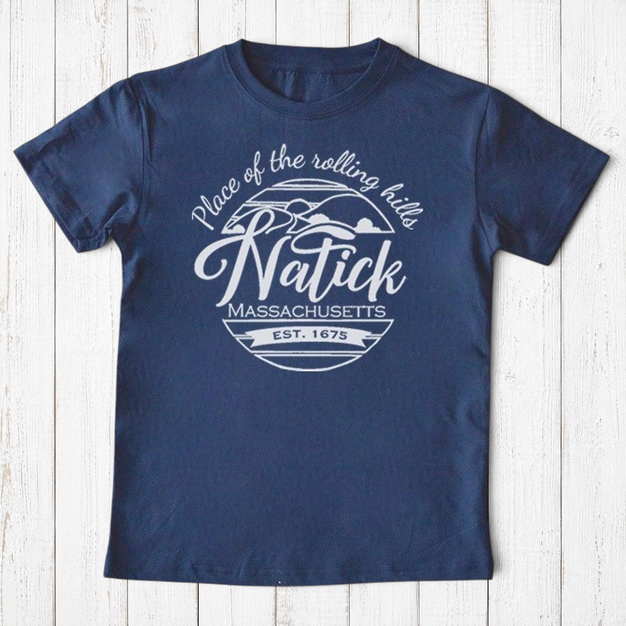 Uni-T navy blue organic cotton kids t-shirt featuring a white Natick Massachusetts circle logo graphic design.