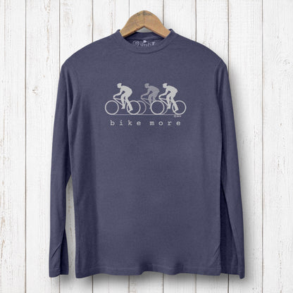 Uni-T men's navy bamboo long sleeve t-shirt with white Bike More graphic print on a rustic white wood background.