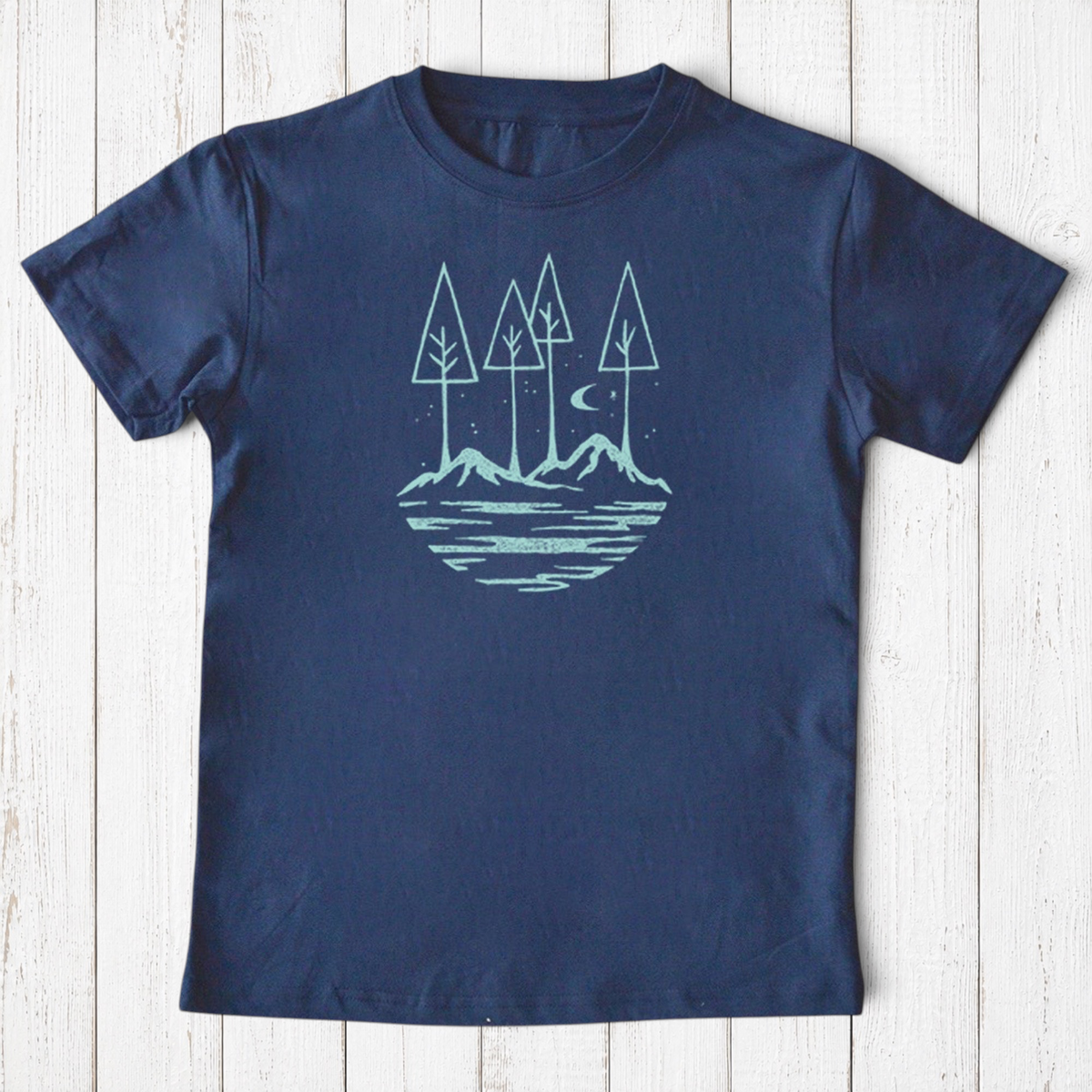 Uni-T navy blue organic cotton kids t-shirt featuring a hand-illustrated nature graphic of trees, river, and moon.
