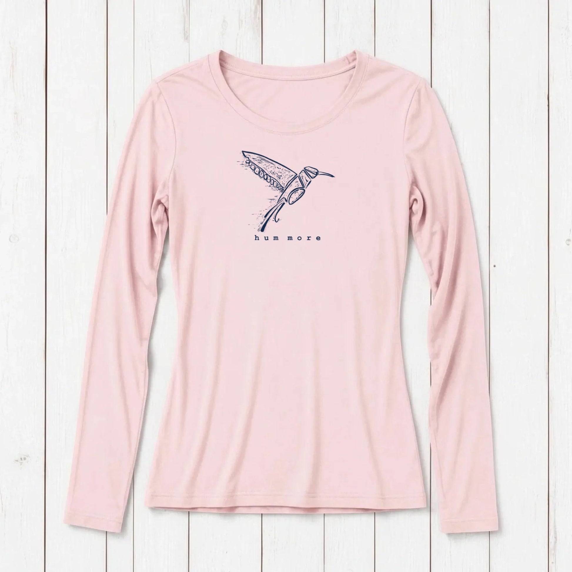 Uni-T women's soft pink long sleeve bamboo and organic cotton blend t-shirt on a white wooden background