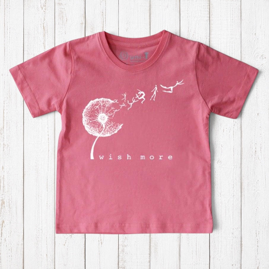 Uni-T organic cotton kids t-shirt in dusty pink featuring a white hand-drawn dandelion graphic and Wish More text.