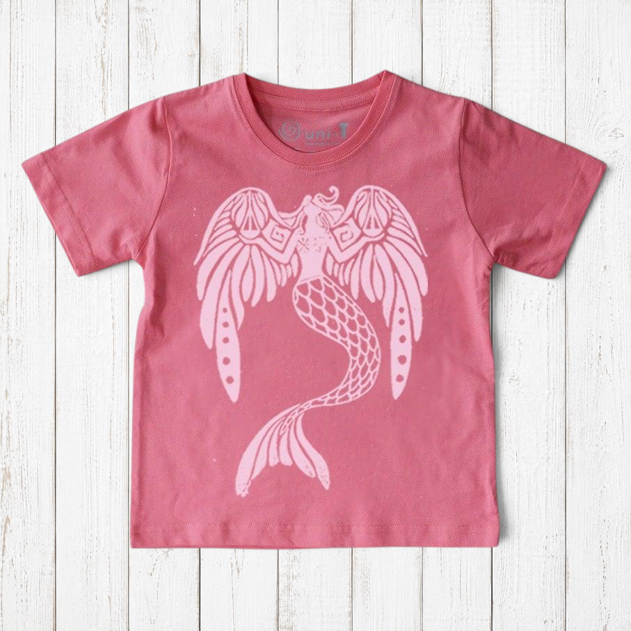 Uni-T organic cotton kids t-shirt in dusty pink featuring a white hand-illustrated mermaid graphic with scales.