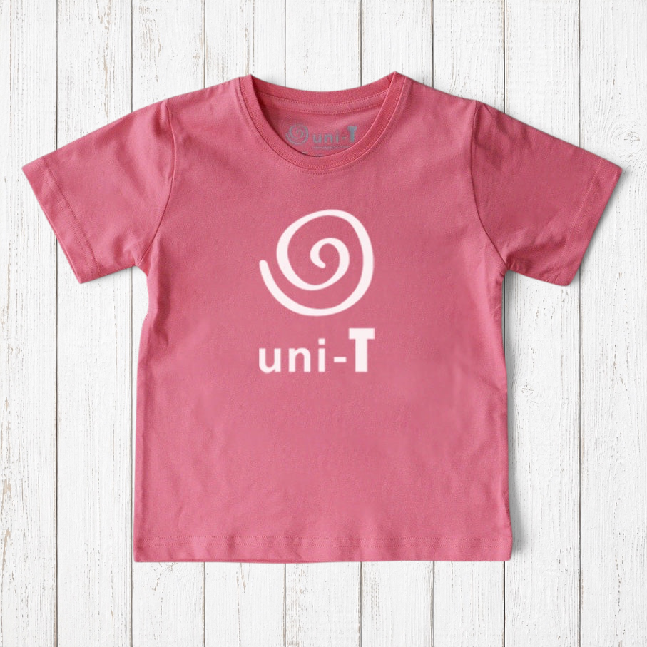 Uni-T kids organic cotton t-shirt in dusty pink with a white spiral unity graphic logo on a rustic wood background