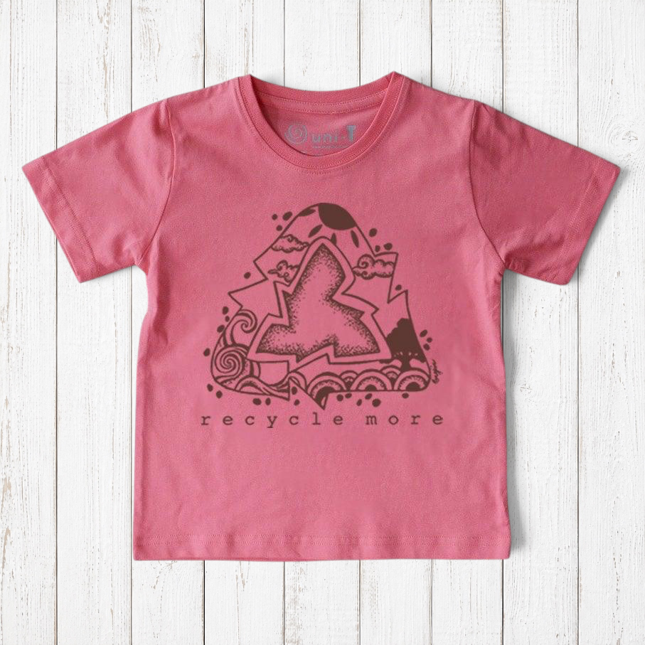 Uni-T kids organic cotton t-shirt in pink with a black hand-illustrated Recycle More graphic on a wood background.