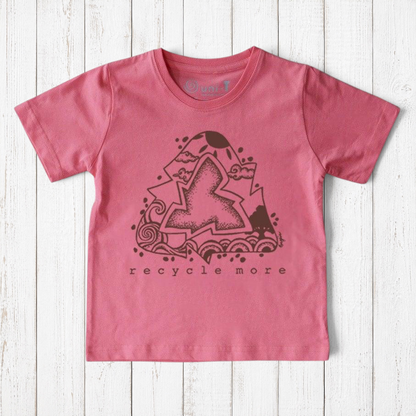 Uni-T kids organic cotton t-shirt in pink with a black hand-illustrated Recycle More graphic on a wood background.