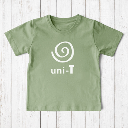 Uni-T kids organic cotton t-shirt in sage green with a white spiral unity graphic logo on a rustic wood background