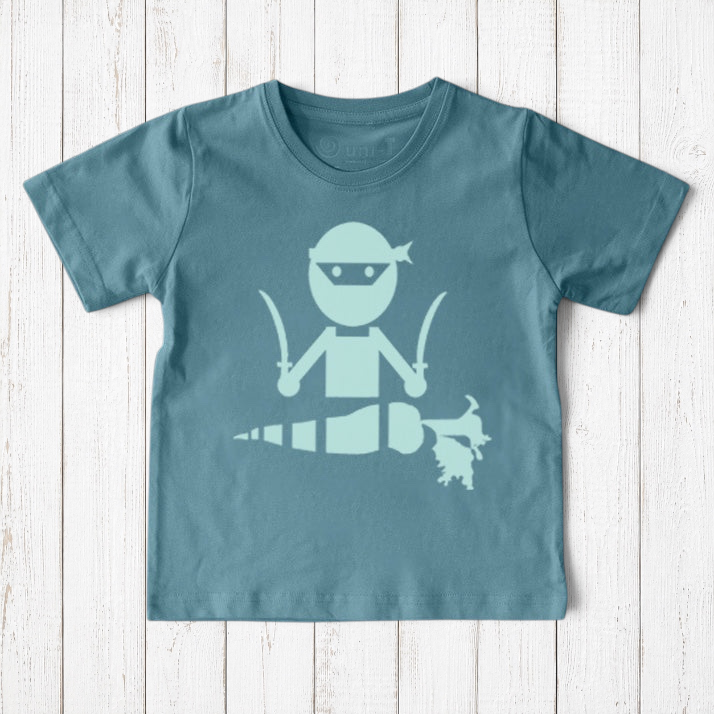 Uni-T kids organic cotton t-shirt in blue featuring a hand-illustrated ninja chopping a carrot with swords