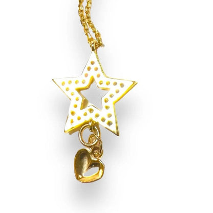 Back view of Cubic Zirconia Star Necklace showing gold star pendant with heart charm, highlighting detailed craftsmanship and polished finish.