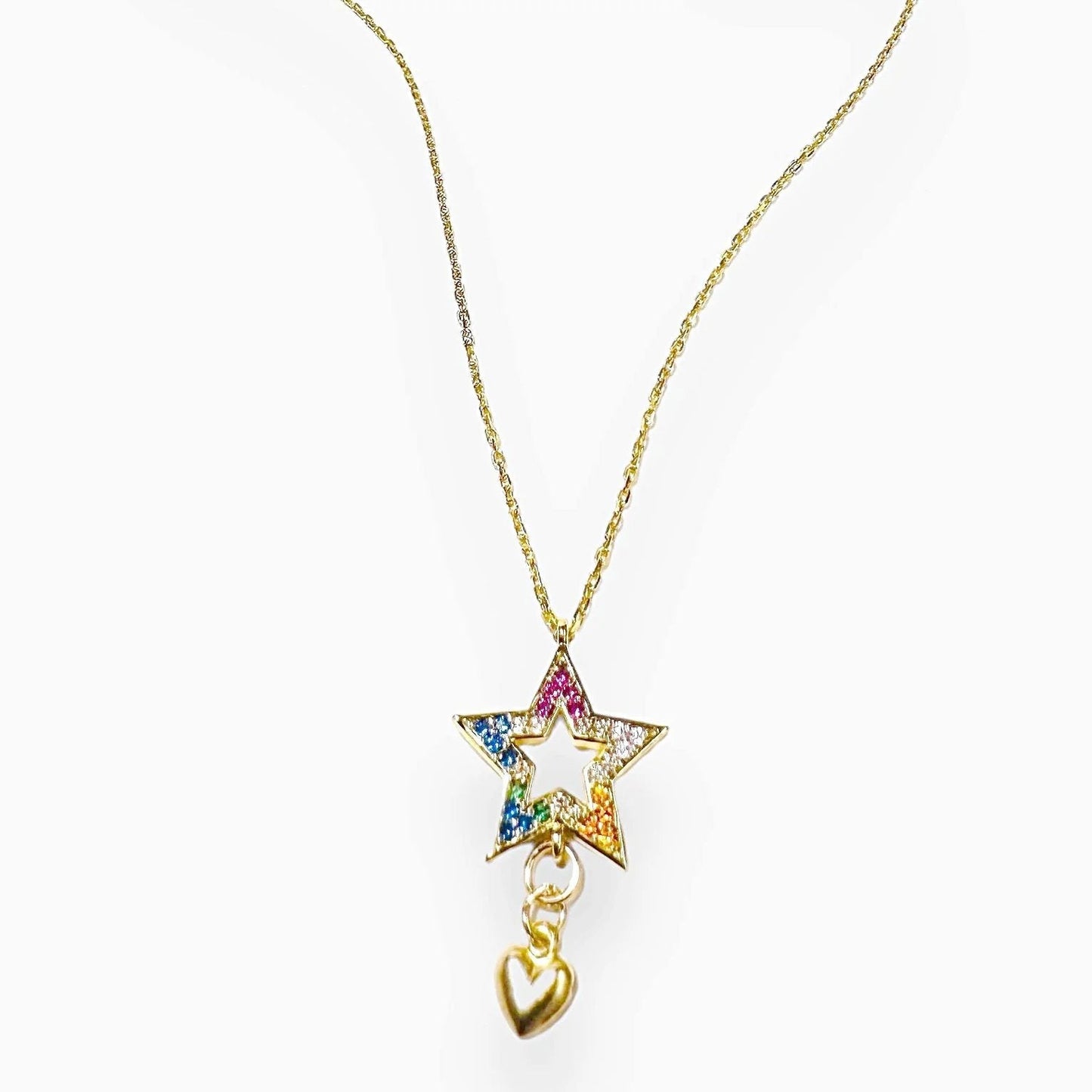 Cubic Zirconia Star Necklace with vibrant multicolor gems and gold heart charm, suspended on an 18in gold-filled chain for layering.