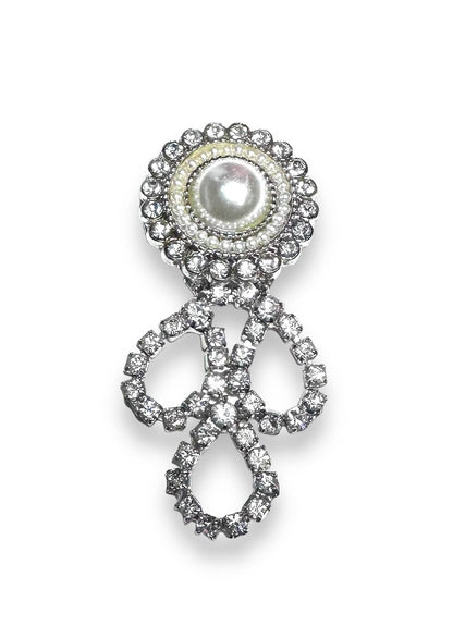 Elegant Uni-T magnet brooch with pearl center and rhinestone loops, perfect for accessorizing scarves or as a unique small gift.