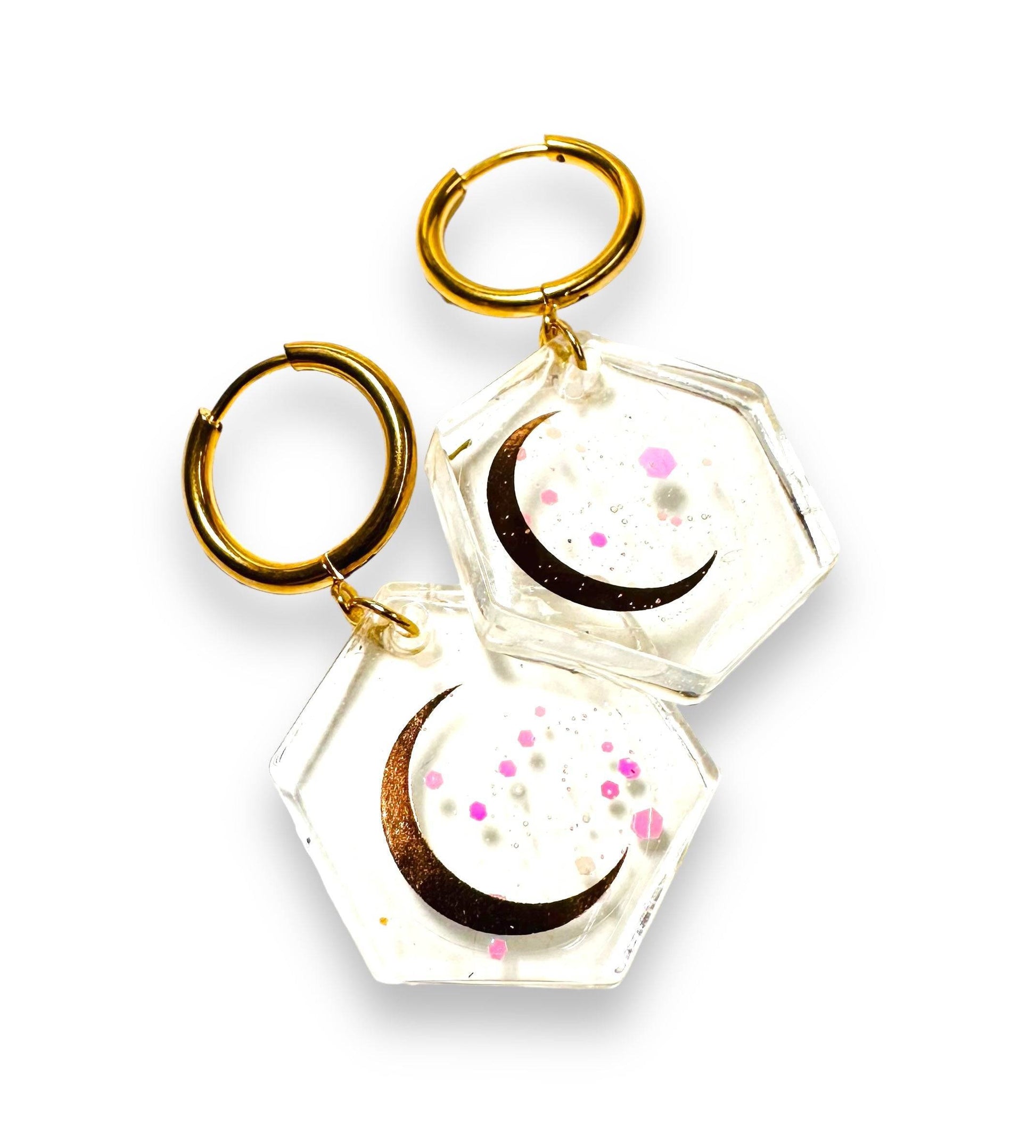 Hexagon resin earrings with gold hoops and crescent moon design. Accented with pink speckles from the Real Flower Earrings series.