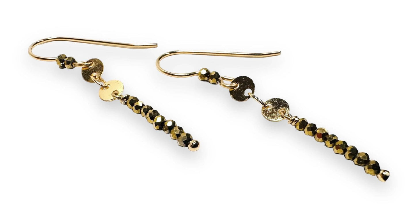 Detailed view of Dainty Gemstone Earrings - Gemstone Silver Earrings with shimmering hematite beads and gold disc accents. Unique handcrafted jewelry.