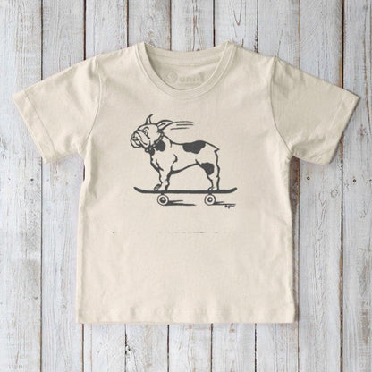 Cream-colored Kids’ Organic Cotton T-Shirt with a black French Bulldog on skateboard print. Sustainable Uni-T graphic top for children.