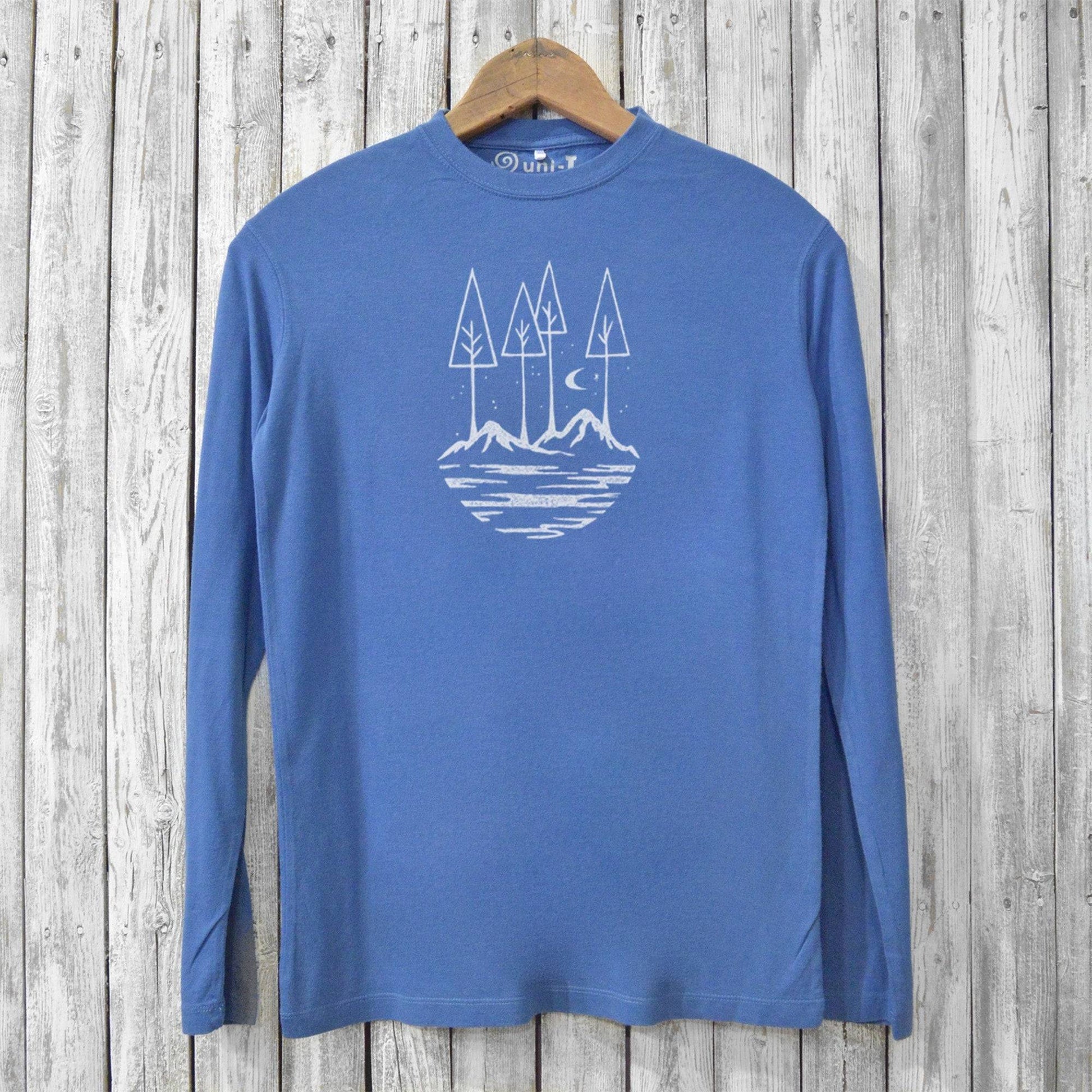 Men's bamboo nature t-shirt in blue with mountain and tree graphic. Eco-friendly long sleeve shirt made from organic cotton and bamboo blend.