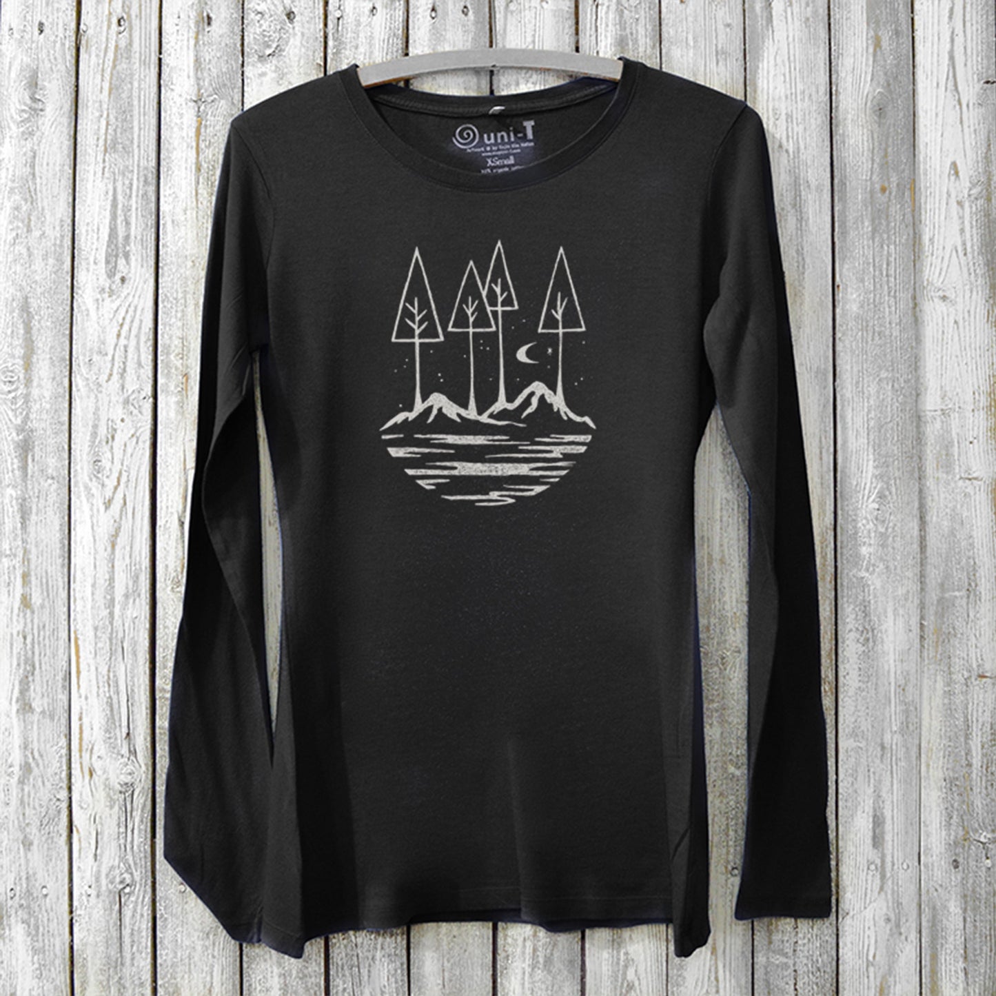 Black women's bamboo and organic cotton long sleeve T-shirt featuring a white nature scene graphic, sustainable inspirational gift for her.