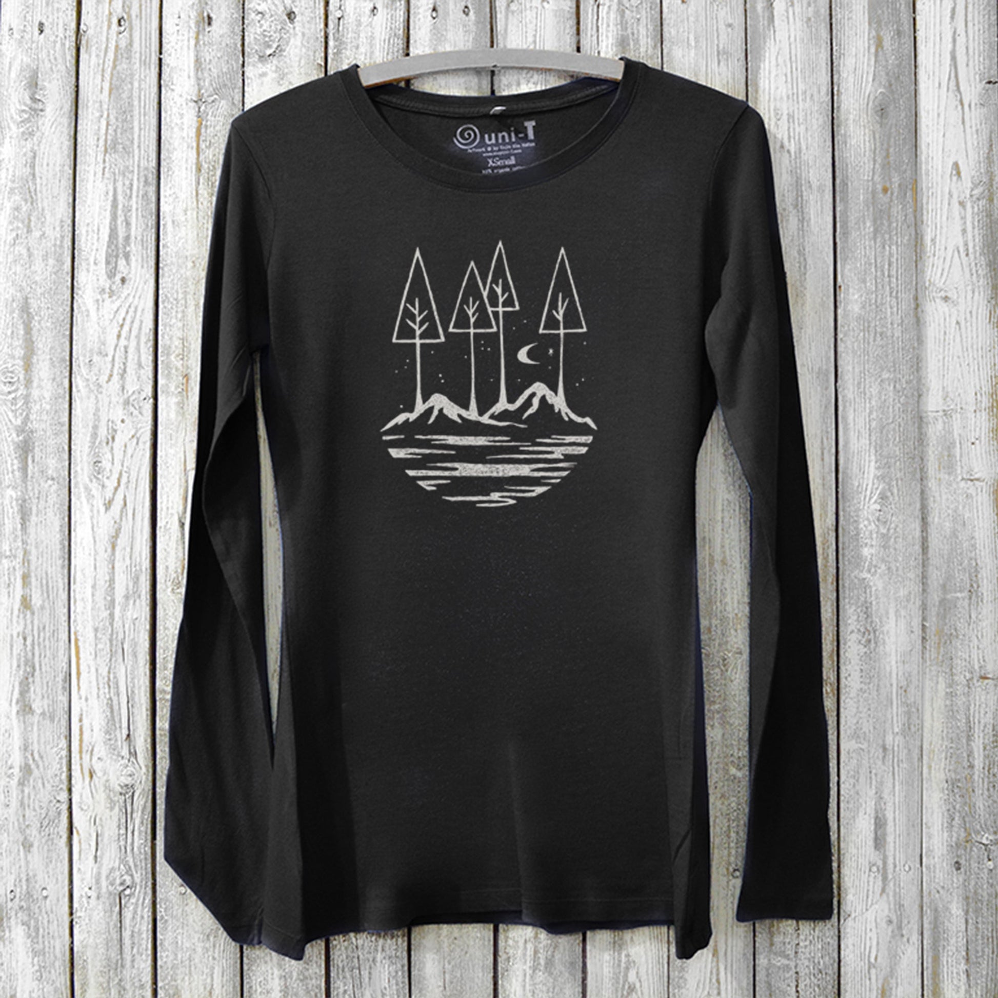 Black women's bamboo and organic cotton long sleeve T-shirt featuring a white nature scene graphic, sustainable inspirational gift for her.
