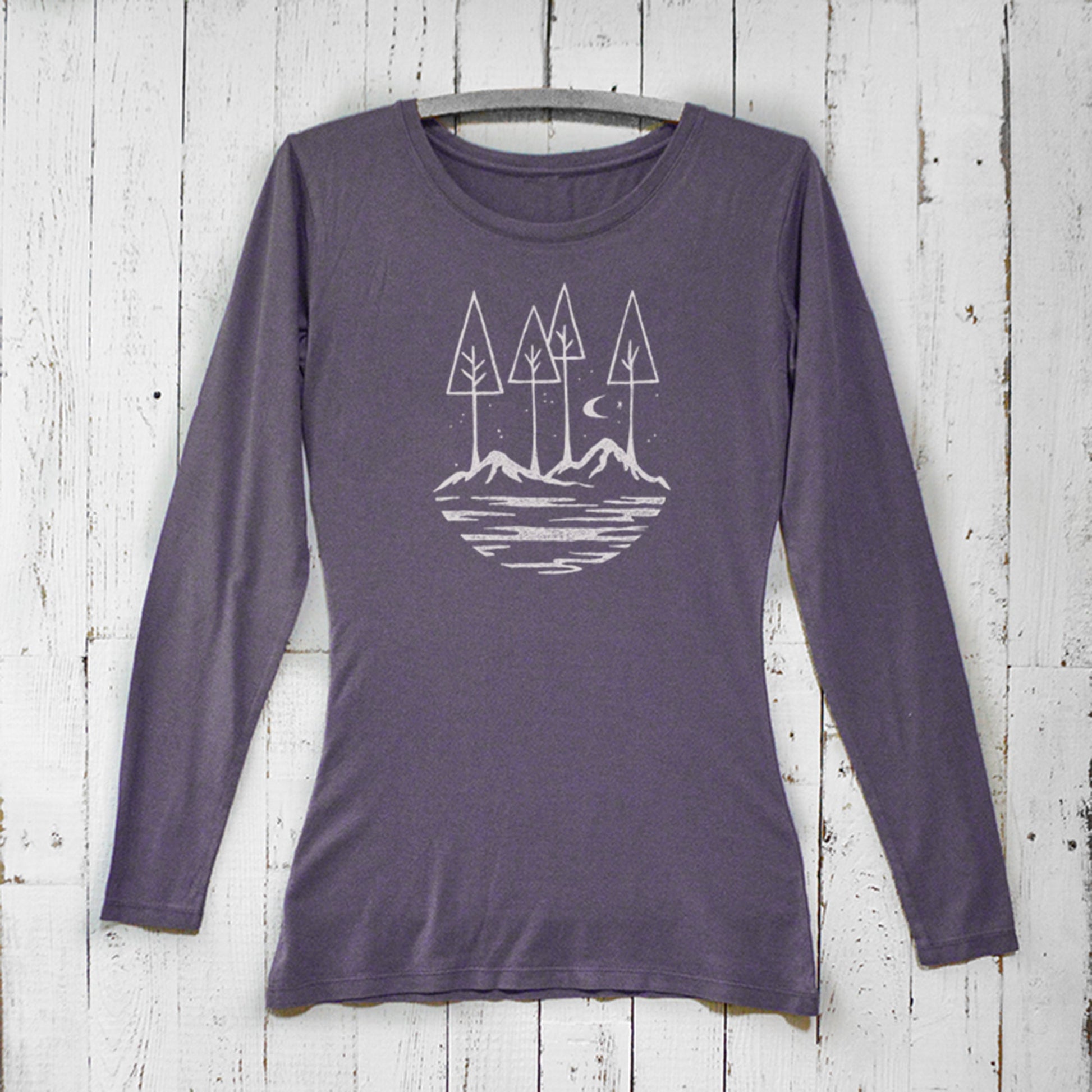 Purple women's bamboo and organic cotton long sleeve shirt with white mountain and tree graphic, soft sustainable top for nature lovers.