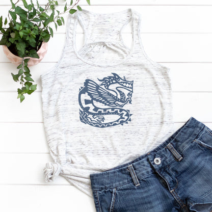 White racerback dragon tank top for women featuring a bold mythical dragon design, styled with denim shorts for a casual look.