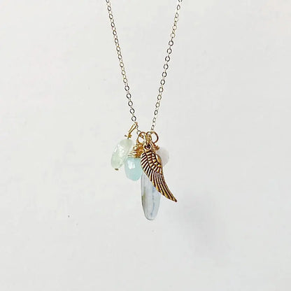 Gold Filled Gemstone Charm Necklace with angel wing pendant, aquamarine, and pearl charms, ideal for elegant jewelry collections.