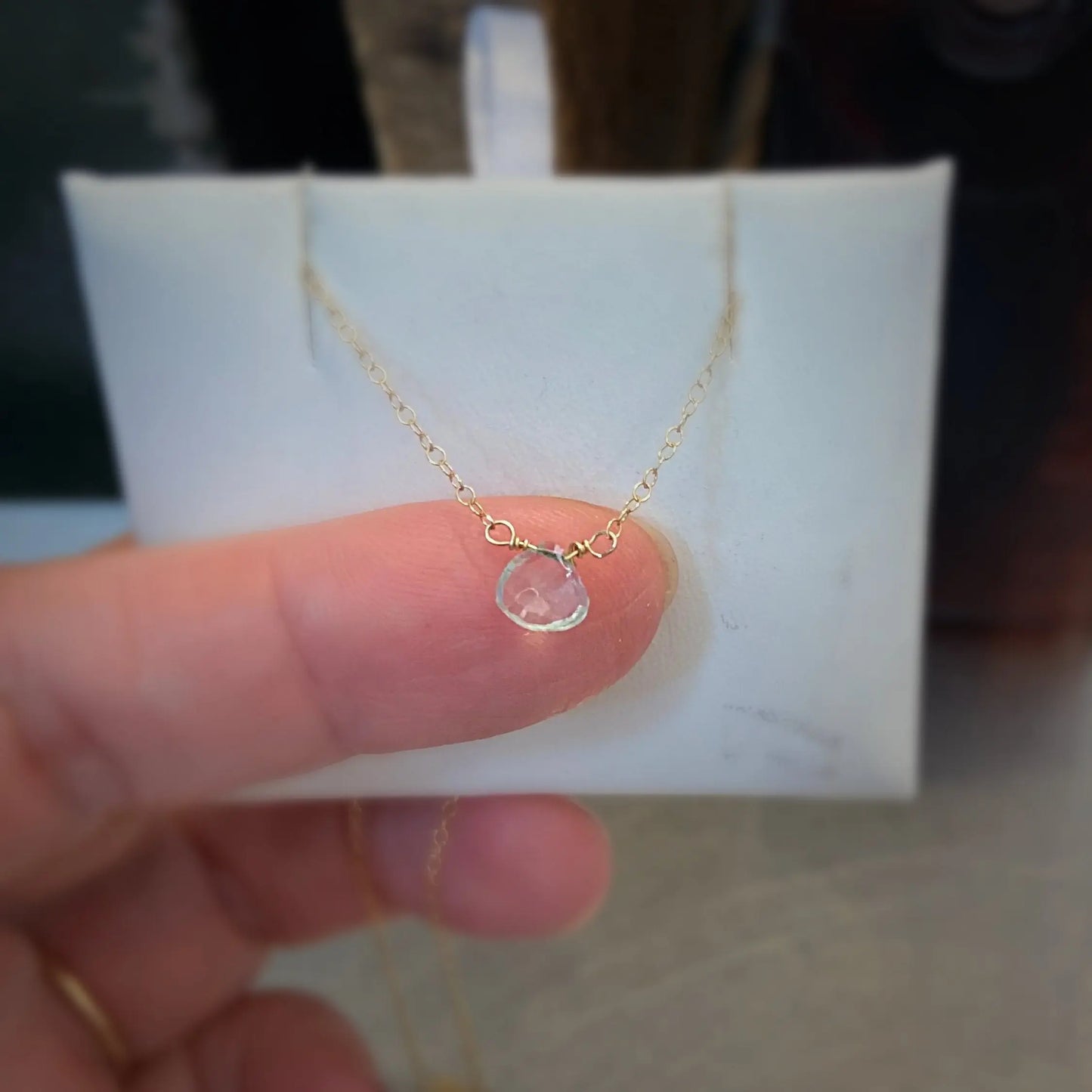 Aquamarine Necklace - Gemstone Jewelry|Elegant Design featuring a delicate gold chain and a faceted aquamarine gemstone pendant. Ideal for minimalist style lovers.