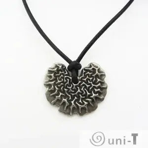 Bacillus subtilis Necklace with black cord featuring a silver-toned pendant inspired by biofilm patterns. Unique Bacillus subtilis jewelry design.