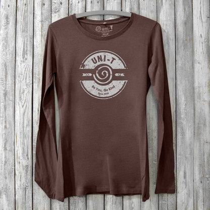 Brown bamboo and organic cotton women's long sleeve T-shirt with 'Be You, Be Kind' message. Cozy graphic tee by Uni-T promoting positivity.