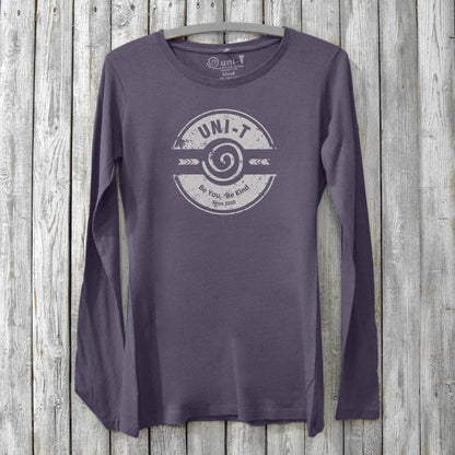 Purple eco-friendly women's long sleeve tee with 'Be You, Be Kind' design. Made from bamboo and organic cotton by Uni-T for mindful fashion lovers.