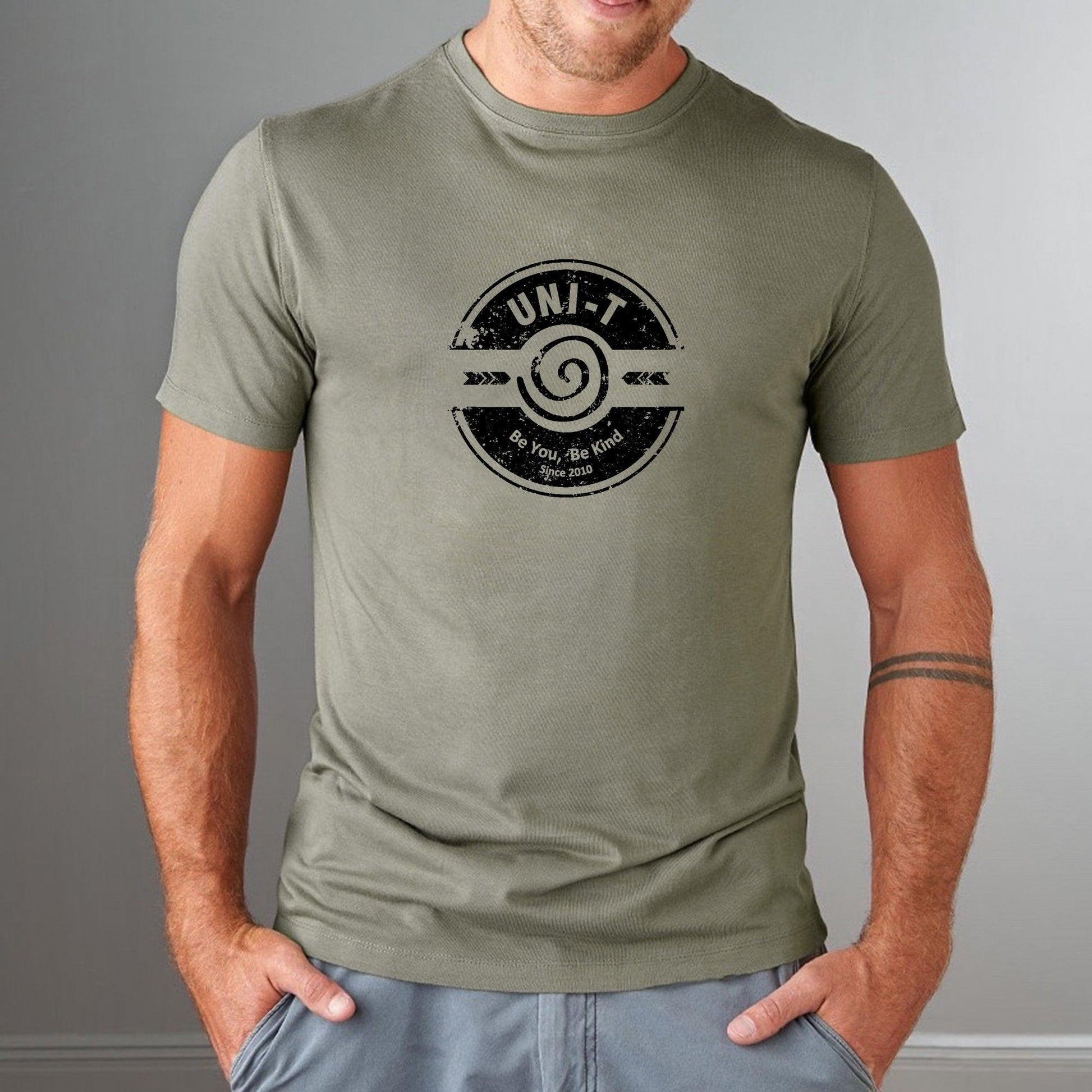 Olive green 'Be You Be Kind' men's bamboo & organic cotton t-shirt by Uni-T, soft eco-friendly graphic tee with positive message.