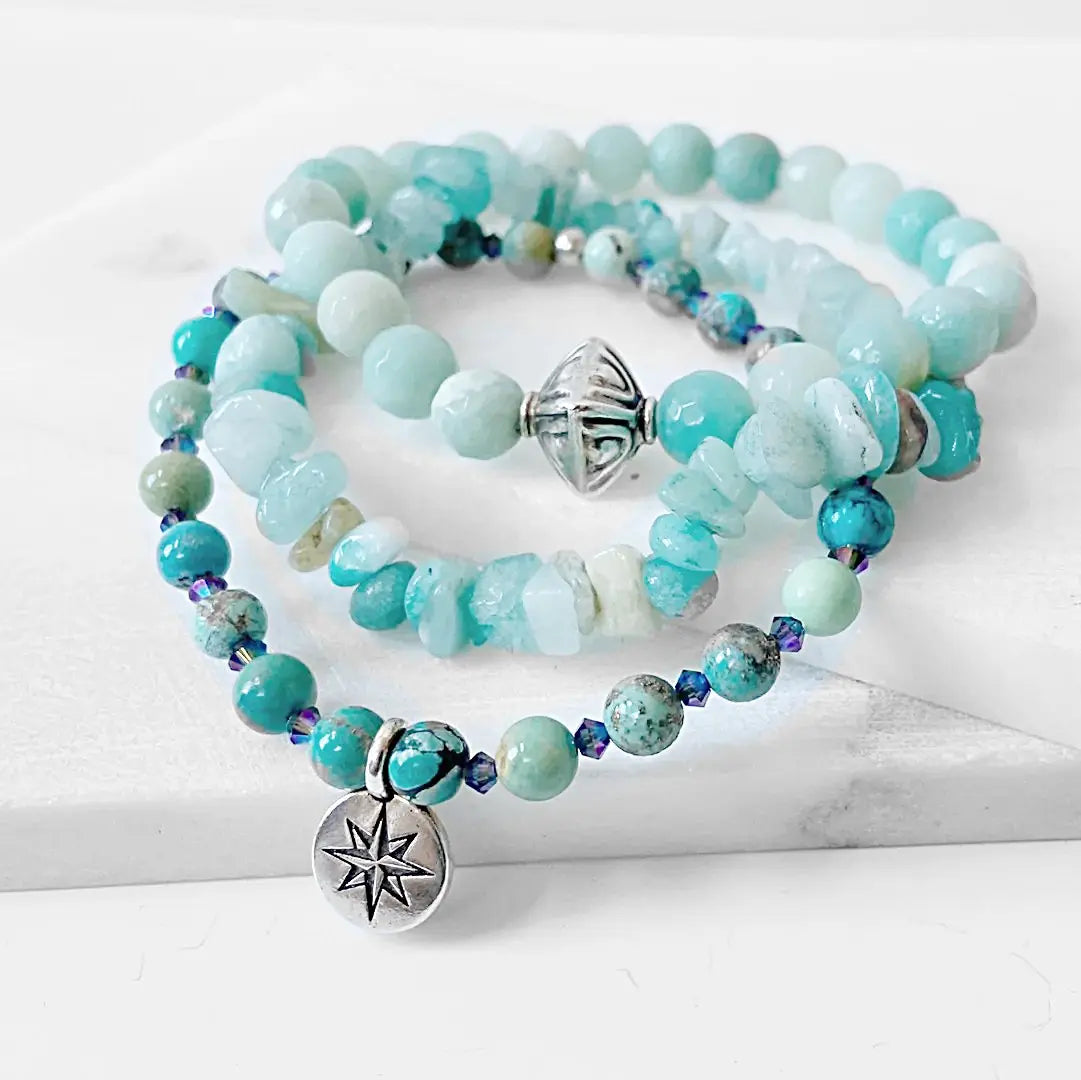 Beaded Bracelet Stack - Beaded Stack Bracelets | 3 Piece Set includes Amazonite and Chrysocolla beads with silver charm, styled on a white surface.