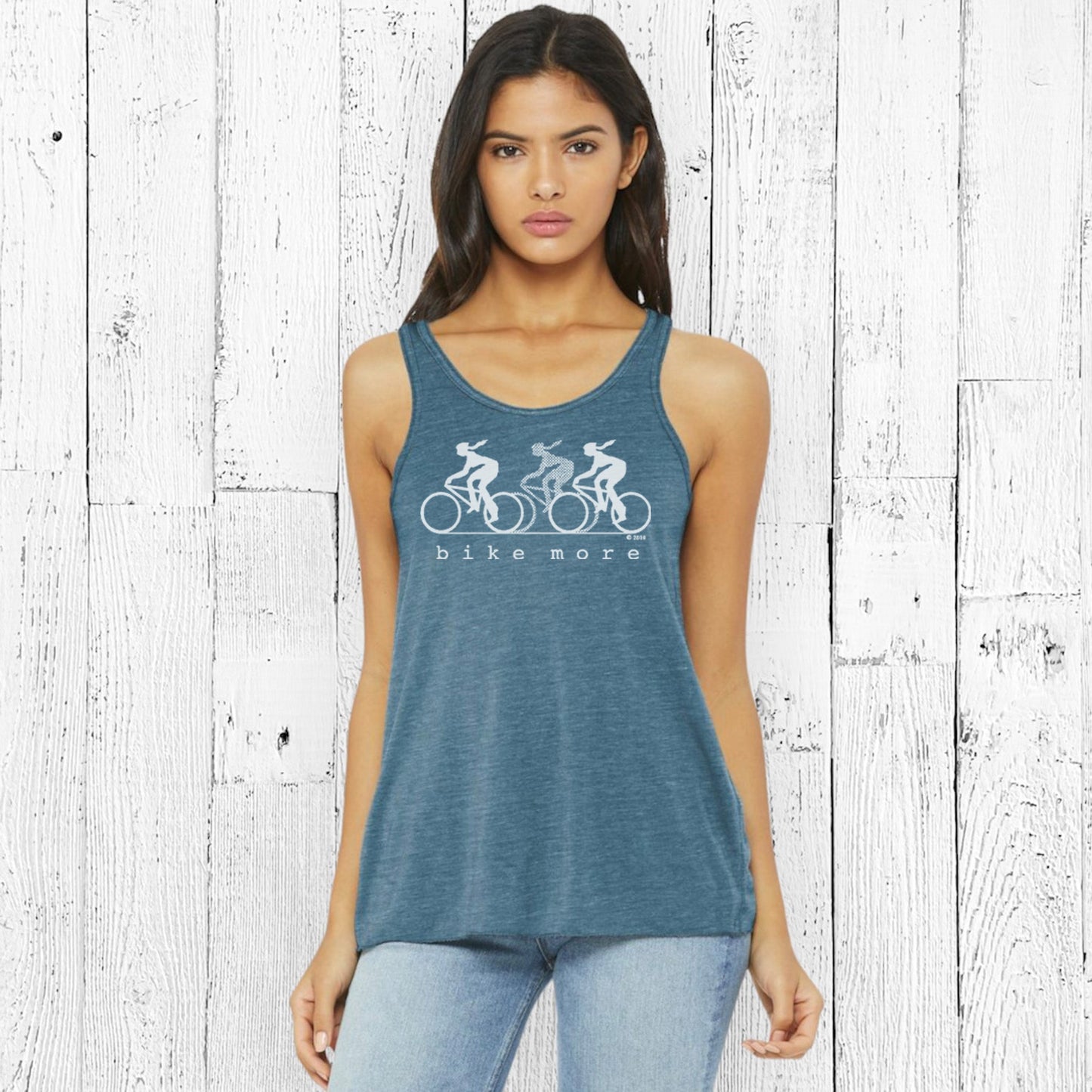 Flowy Tank Top for Women - Eco-Friendly Bike Tee in teal blue with 'bike more' cyclist graphic, ideal for active and sustainable lifestyles.