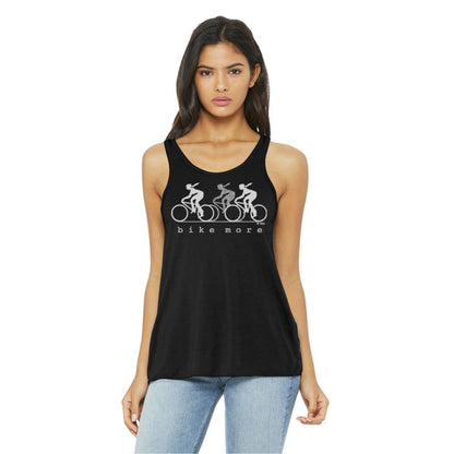 Black flowy tank top for women with silver 'bike more' cyclist print, styled for sustainable fashion and active lifestyle appeal.