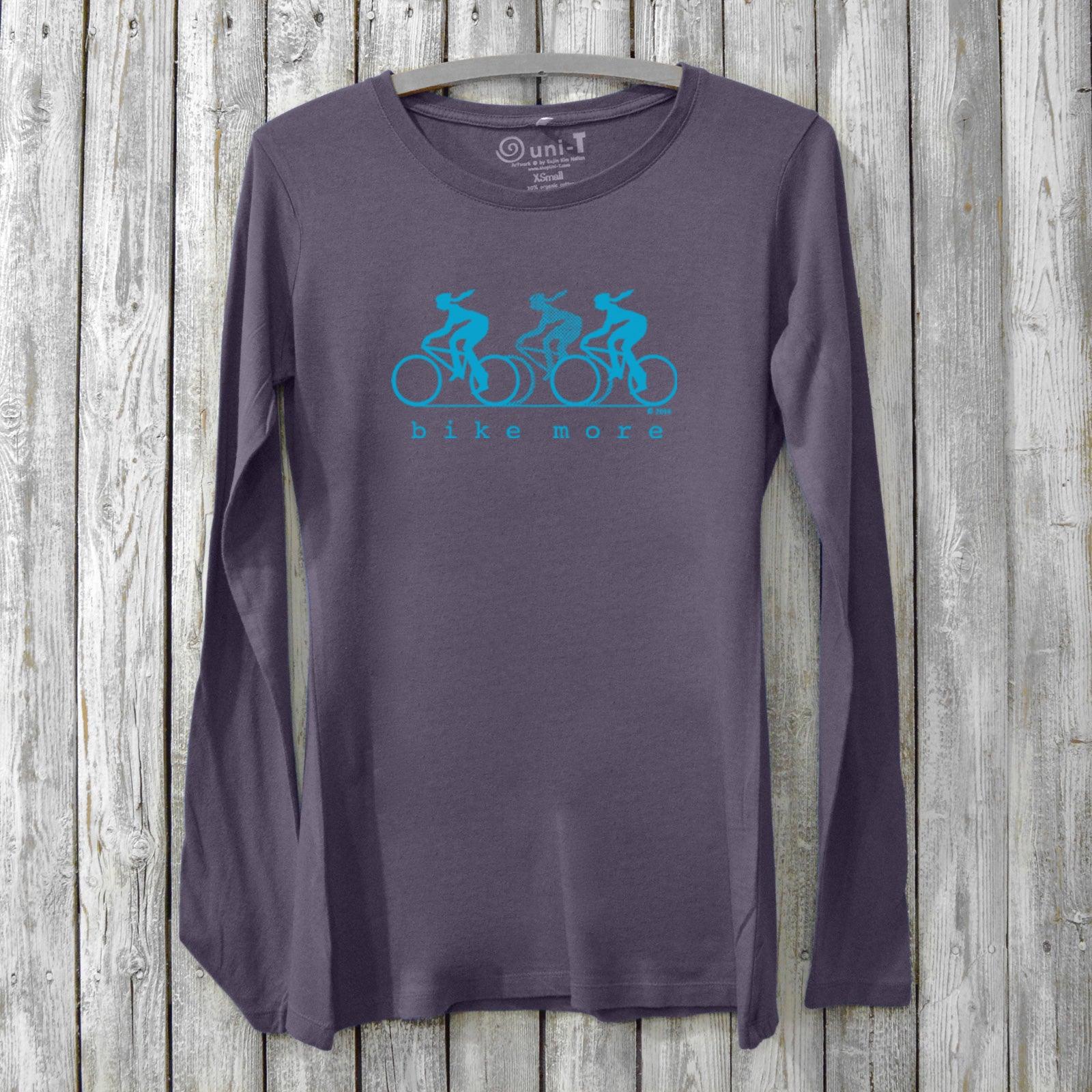 Purple Women's Bicycle Long Sleeve T-Shirt in sustainable bamboo and organic cotton with bright blue 'Bike More' cyclist graphic.