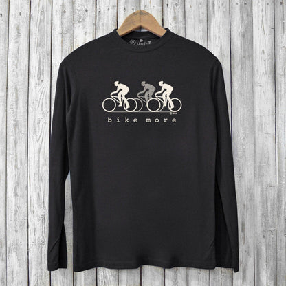 Bike More T-shirt - Eco-Friendly Bike T-shirt in black, showcasing minimalist cyclist print. Sustainable men's long sleeve shirt for biking enthusiasts.