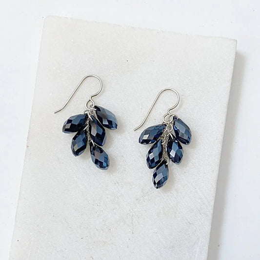 Sterling silver earrings with clustered faceted black crystals in a leaf-like design, part of the Black Crystal Jewelry Set.