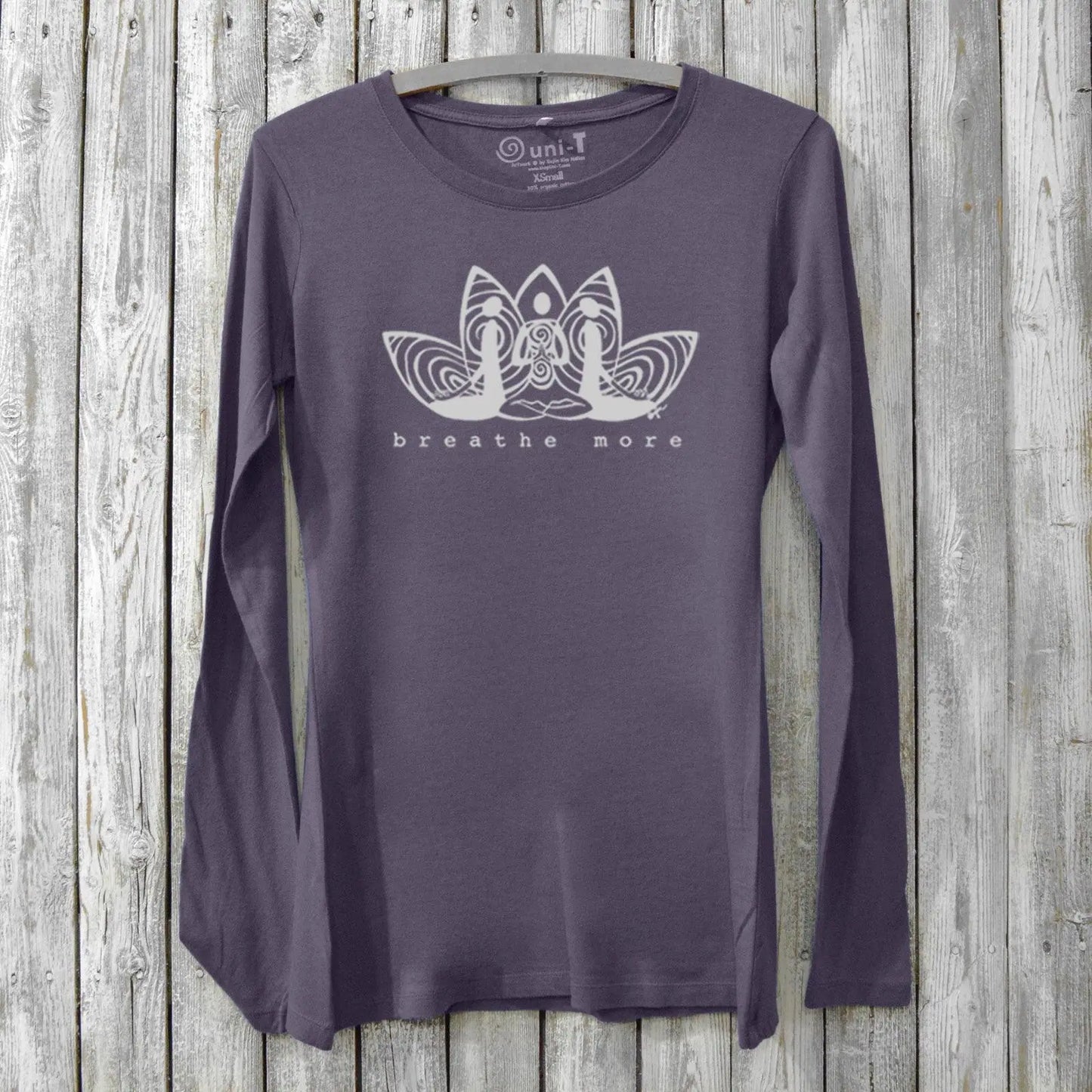 Dark purple women's long sleeve T-shirt made from bamboo and organic cotton featuring 'Breathe More' lotus design. Perfect for relaxation and wellness.
