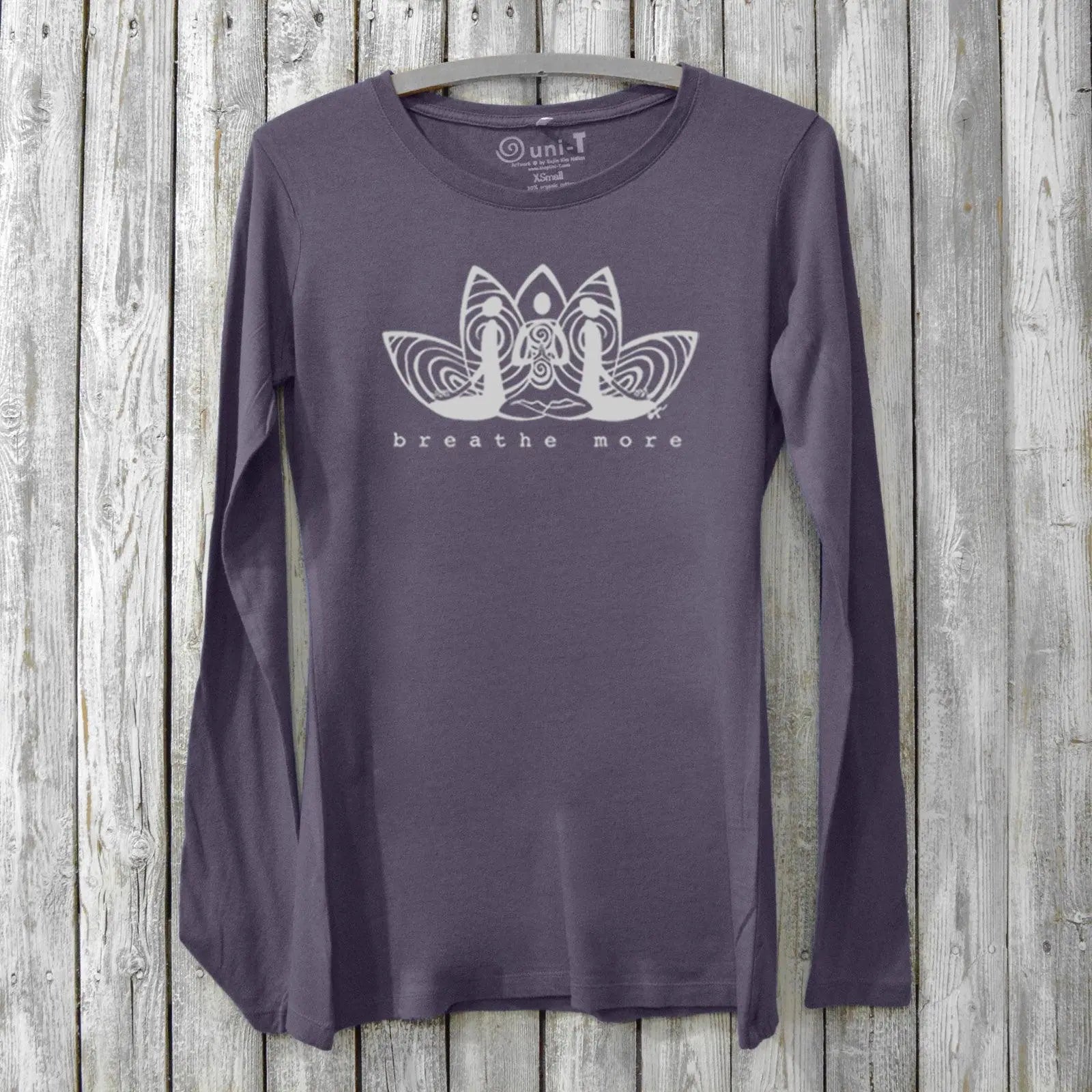 Dark purple women's long sleeve T-shirt made from bamboo and organic cotton featuring 'Breathe More' lotus design. Perfect for relaxation and wellness.