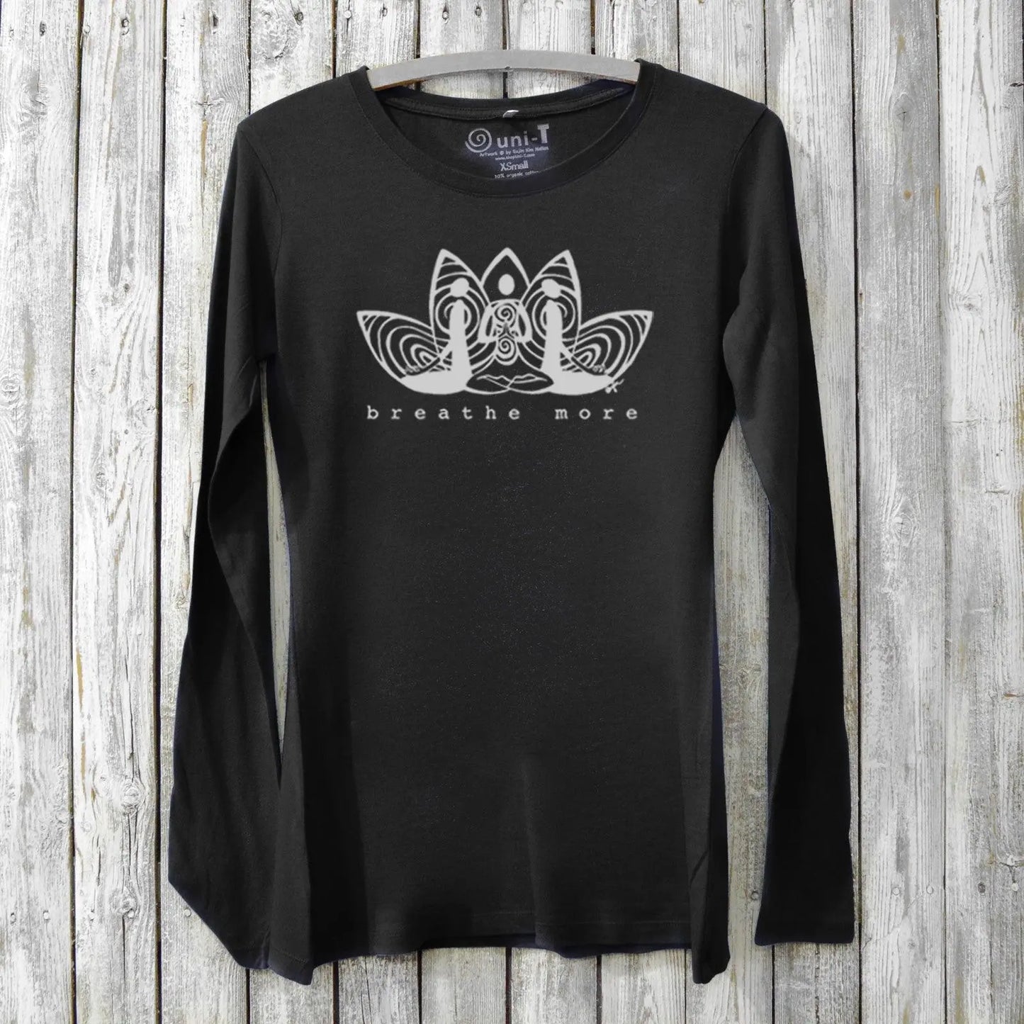 Black women's long sleeve mindfulness T-shirt in bamboo and organic cotton with 'Breathe More' lotus print. Great yoga and relaxation apparel gift.