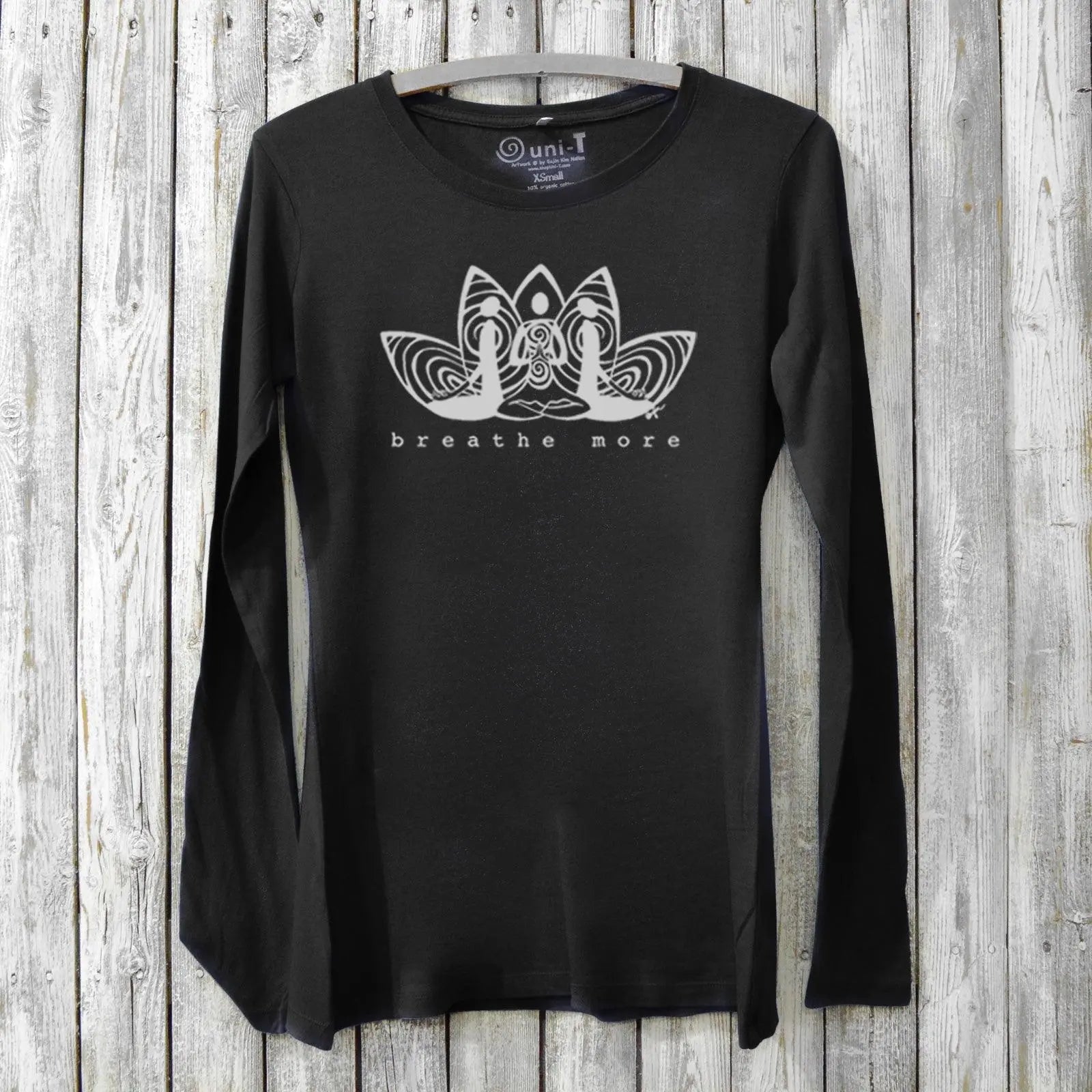 Black women's long sleeve mindfulness T-shirt in bamboo and organic cotton with 'Breathe More' lotus print. Great yoga and relaxation apparel gift.