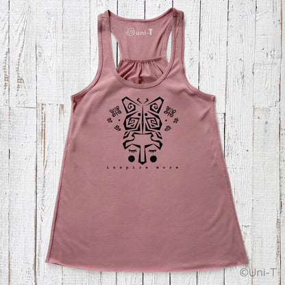 Rose pink "Inspire More" Tank Top with symbolic butterfly face graphic. Soft, USA-made top for women focused on personal growth and change.