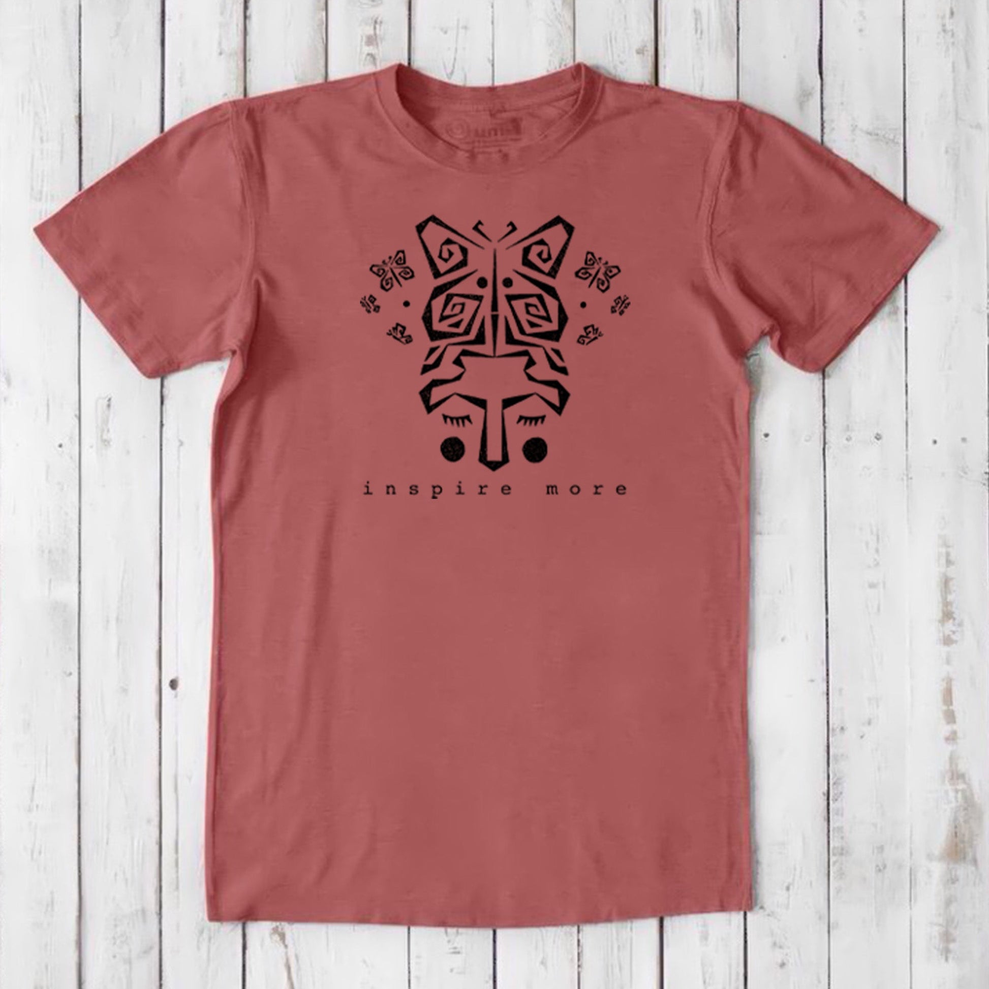 Rust red men's t-shirt with black butterfly and hands graphic. Bamboo & organic cotton blend tee with 'Inspire More' for growth and creativity.