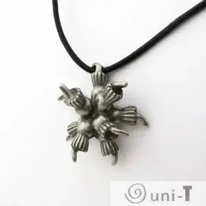 Artistic Choanoflagellate Colony Pendant on black cord, showcasing intricate symmetrical design for science-inspired jewelry lovers.