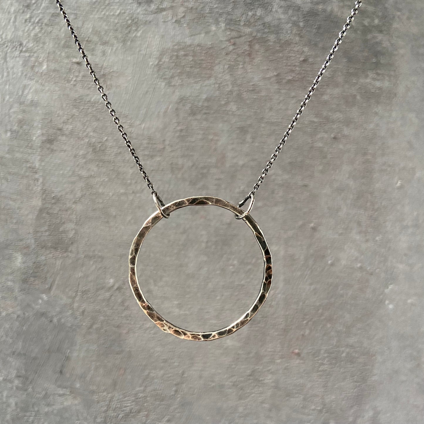 Sterling silver hammered circle necklace with large infinity loop pendant on delicate chain, 18” long with spring ring clasp – Uni-T.