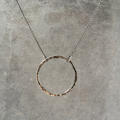 Sterling silver hammered circle necklace with large infinity loop pendant on delicate chain, 18” long with spring ring clasp – Uni-T.