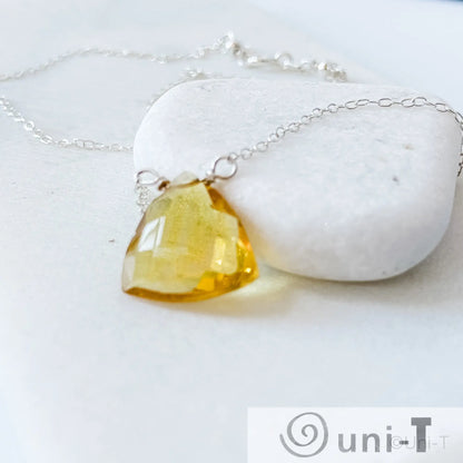 Angled view of Citrine Gemstone Necklace with genuine citrine pendant on fine silver chain, ideal for meaningful jewelry gifts.