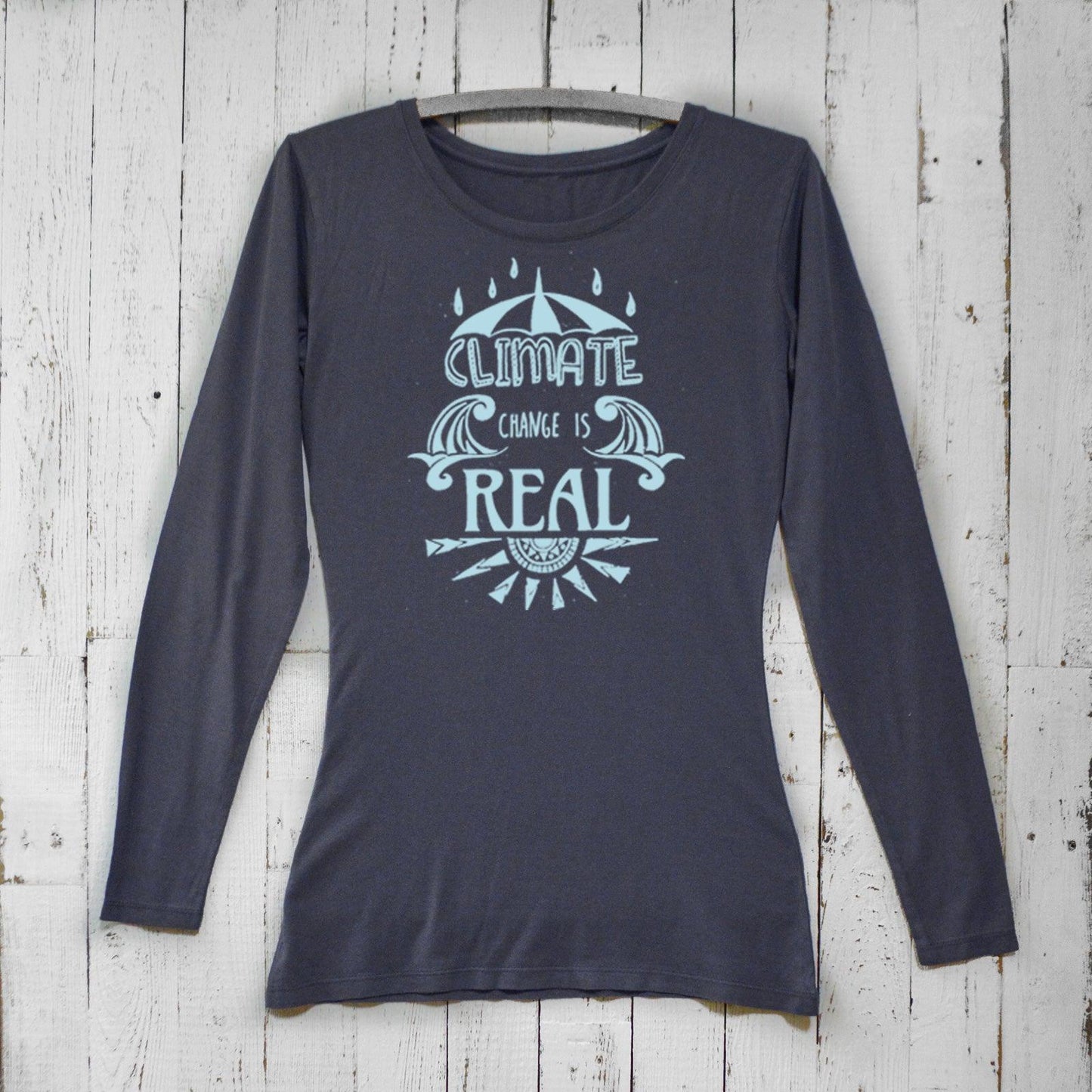 Women's Climate Change Long Sleeve T-Shirt in navy bamboo and organic cotton with 'Climate Change is Real' graphic. Eco-conscious activist apparel.