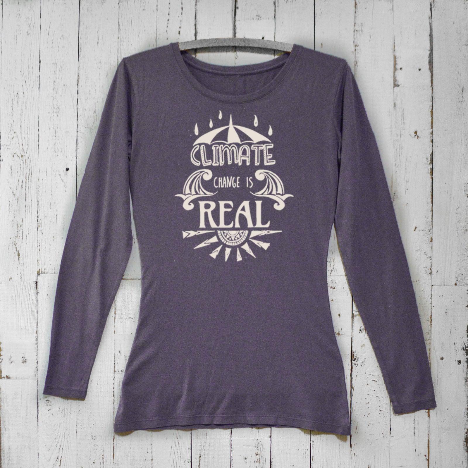 Women's Climate Change Long Sleeve T-Shirt in dark purple bamboo and organic cotton featuring bold 'Climate Change is Real' design. Sustainable gift idea.