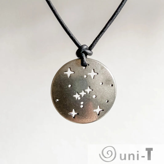 Orion Pendant - Orion Constellation Necklace in pewter with star cutouts on a black cord. Ideal astronomy jewelry for science lovers.