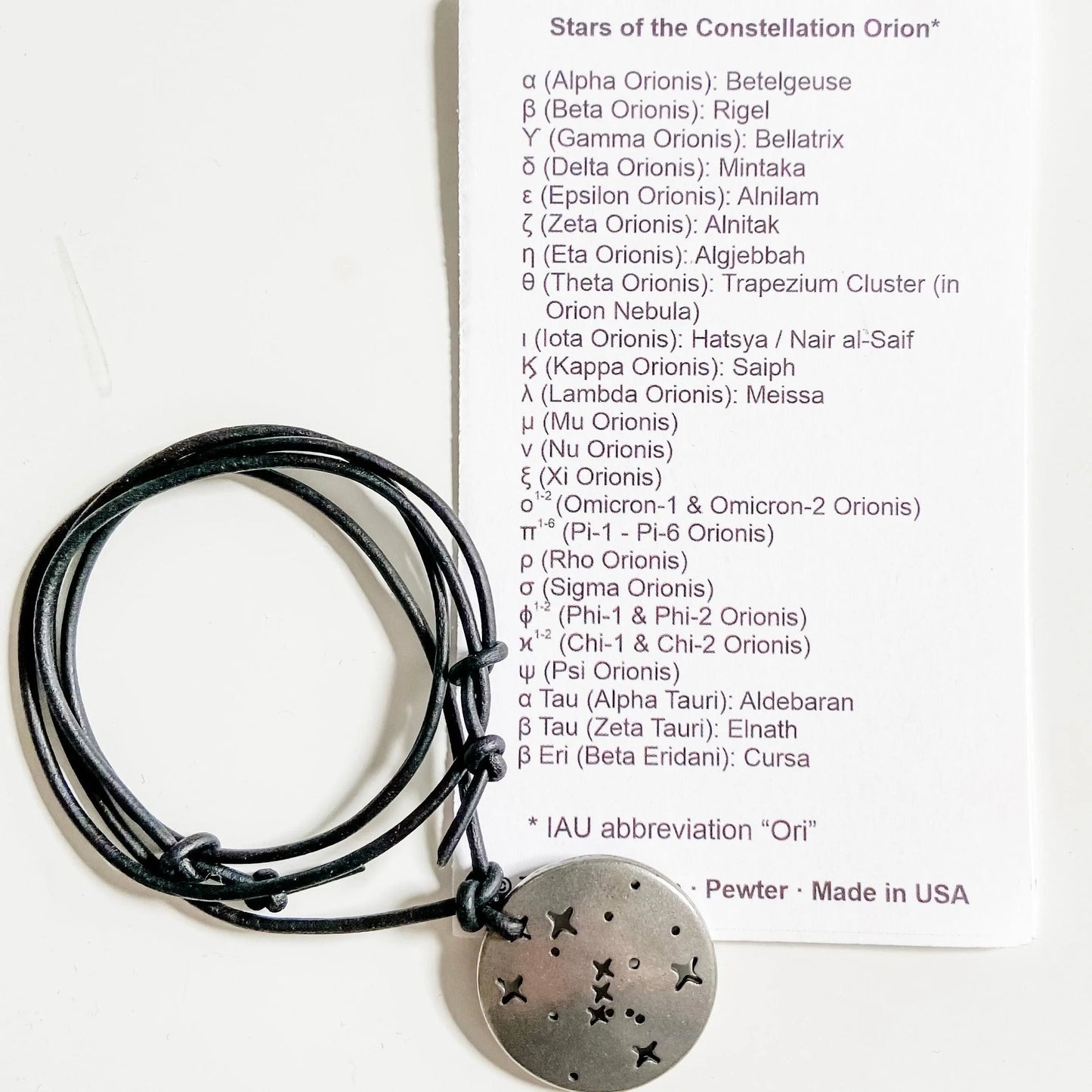 Orion Constellation Necklace with reference card listing star names. Science-themed jewelry for astronomy enthusiasts.