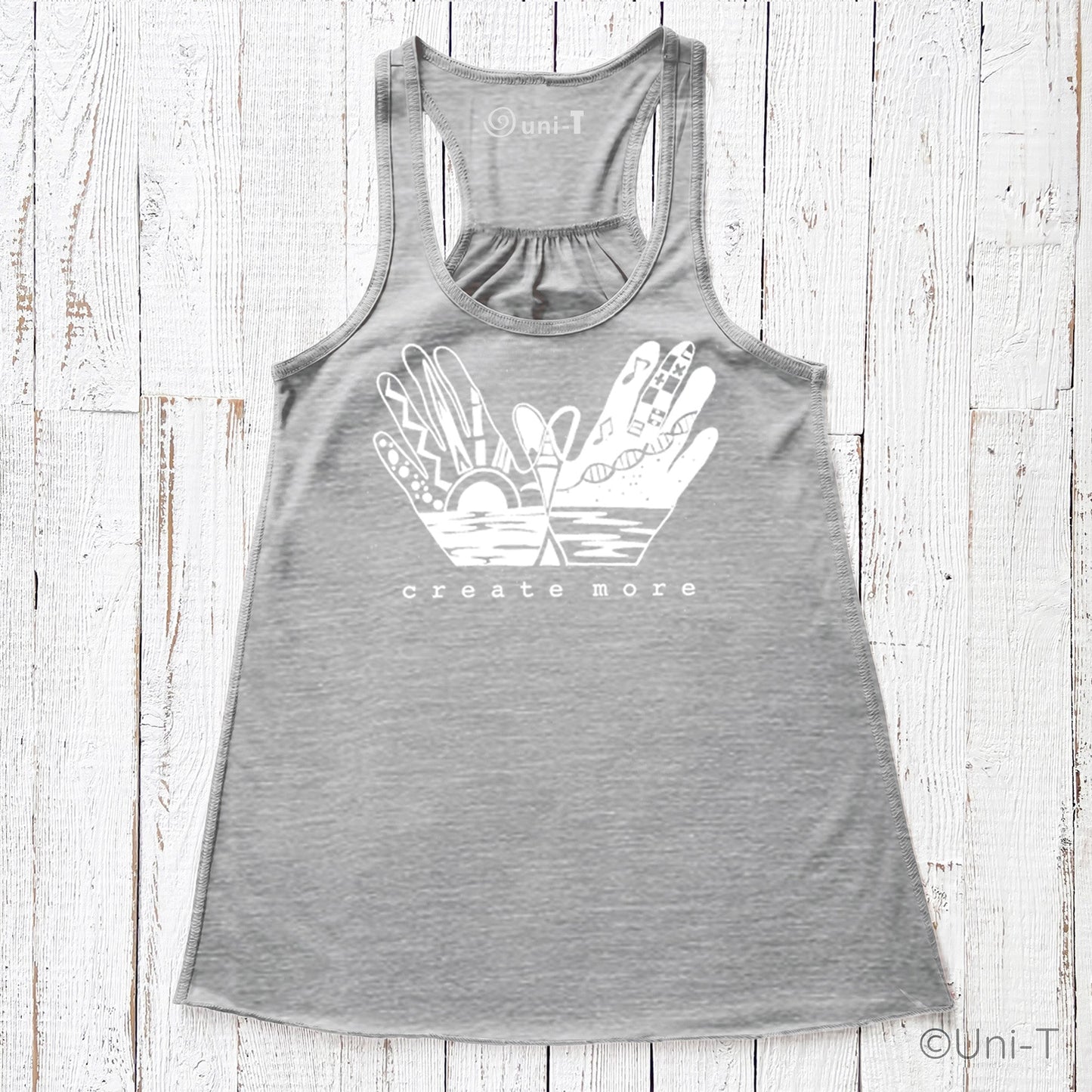Gray 'Create More' flowy tank top for women featuring artistic hand graphic and sunrise design. Creative apparel for artists and makers.
