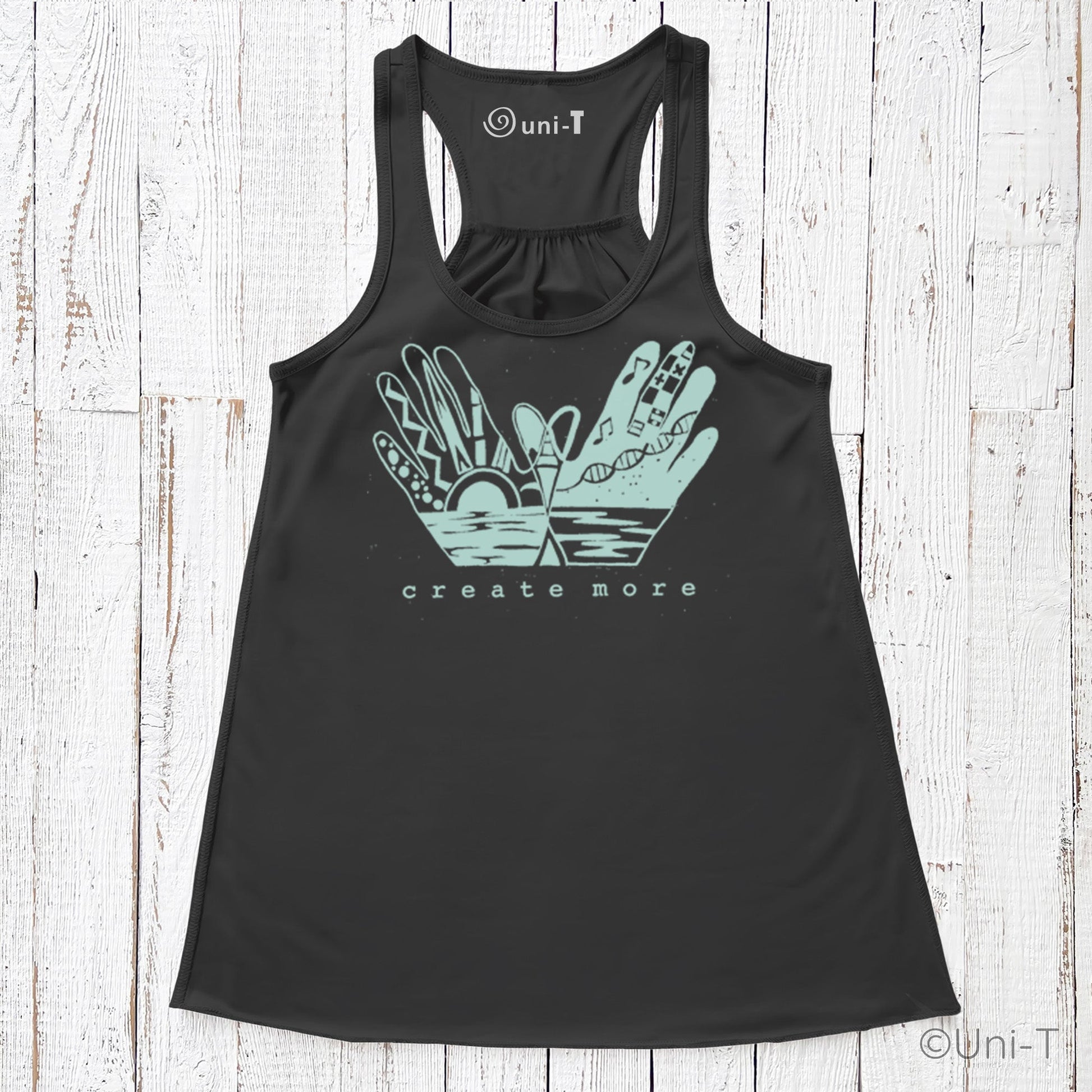 Black 'Create More' flowy tank top by Create More with teal hand art and nature motif. Stylish and soft creative tank for women.